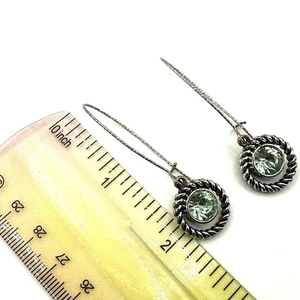 Silver tone green crystal dangling earrings